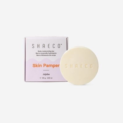 Barra hidratante corporal SHAeco Skin Pamper Jojoba com embalagem e barra creme