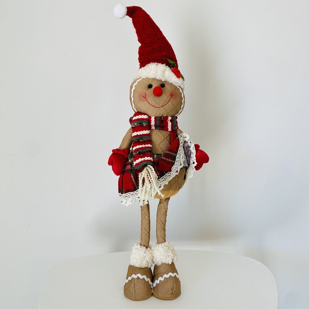 Boneco de Natal decorativo em tecido com chapéu e cachecol vermelhos