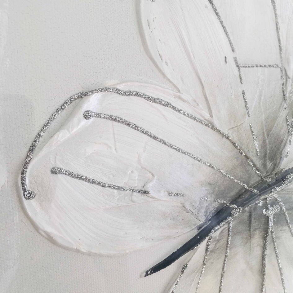 Pintura texturada de asa de borboleta com detalhes prateados