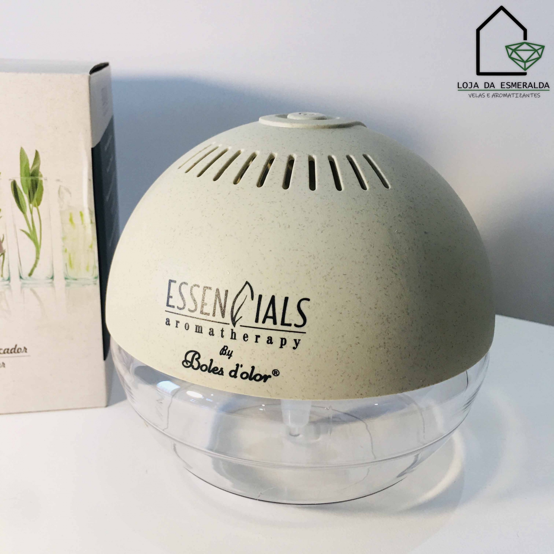 Difusor de aromaterapia redondo bege e transparente com texto impresso