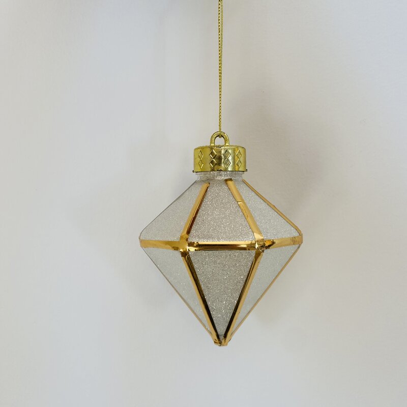 Ornamento de natal prateado e dourado em forma de diamante