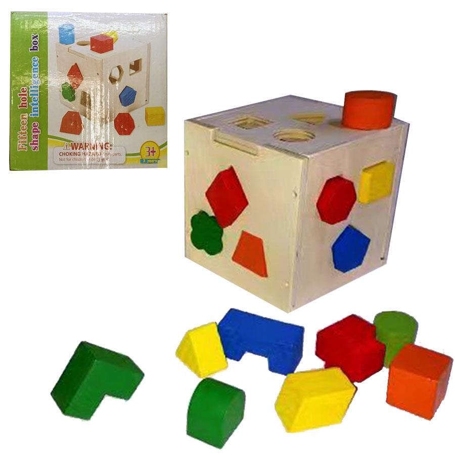 Brinquedo educativo de madeira com cubo e peças geométricas coloridas e embalagem