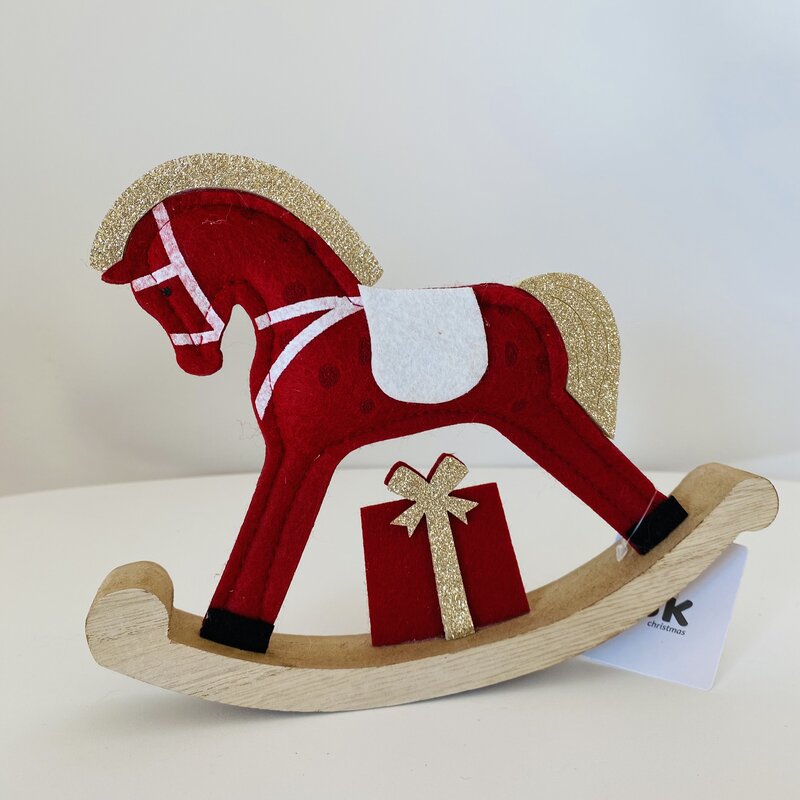 Cavalo de baloiço decorativo vermelho e dourado com presente