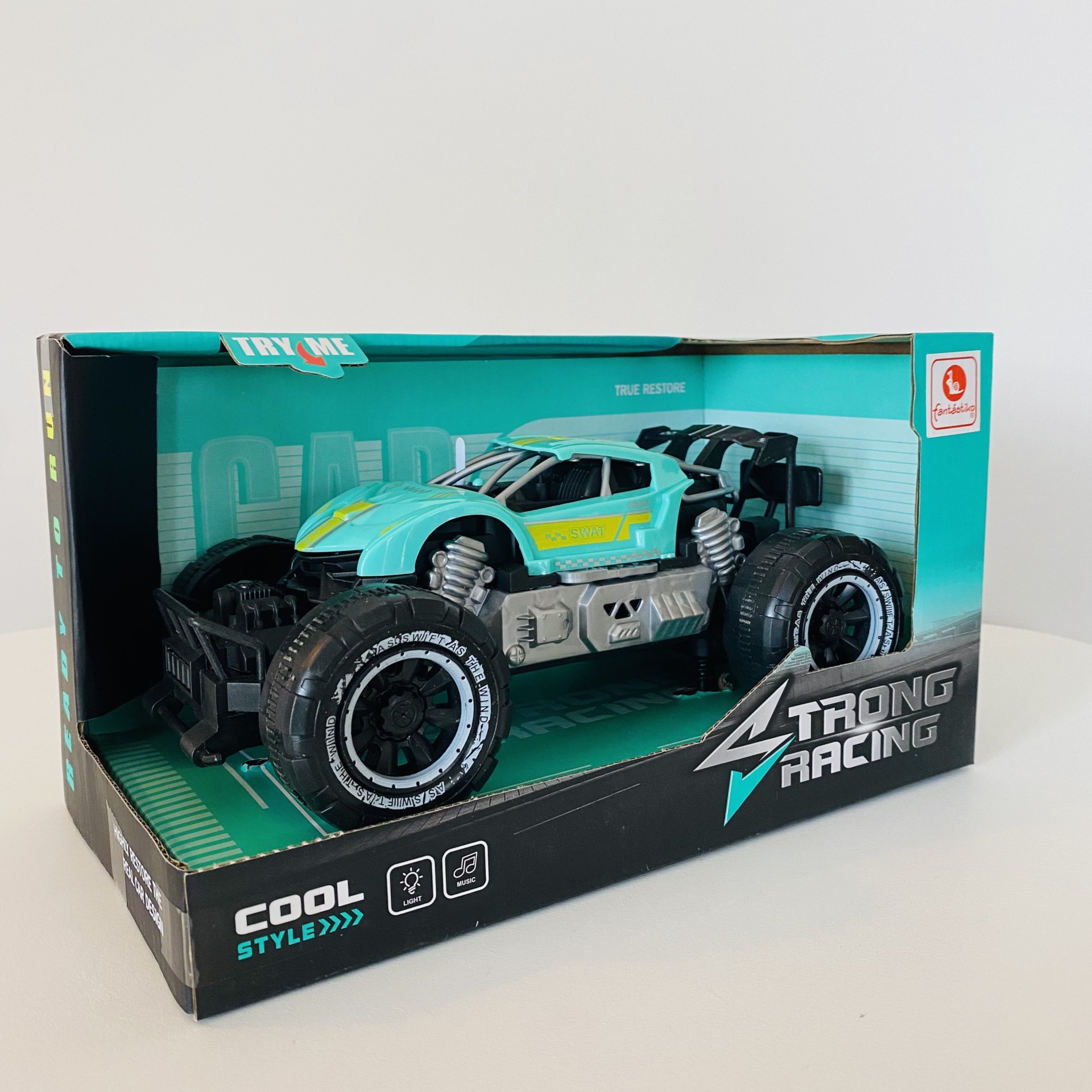 Carrinho de brinquedo Strong Racing azul turquesa em caixa