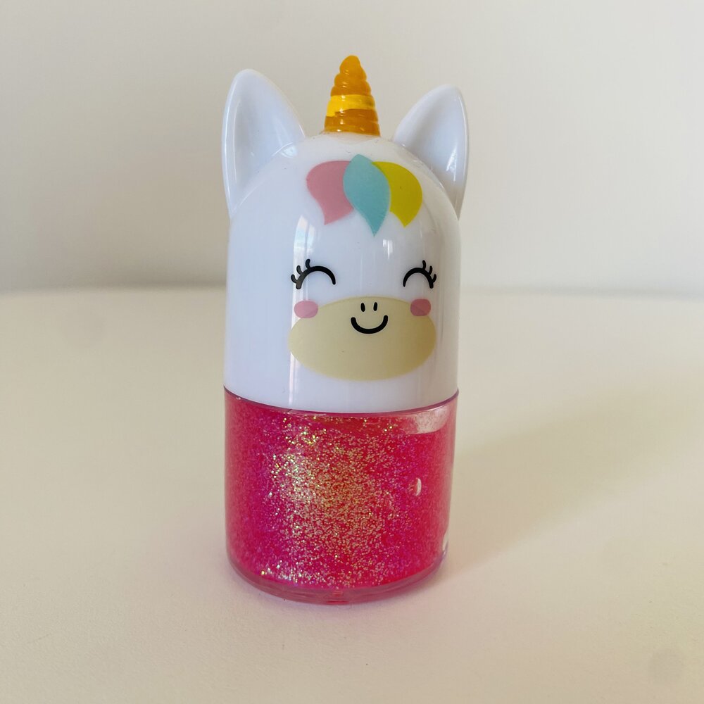 Frasco com tampa de unicórnio e verniz brilhante cor-de-rosa