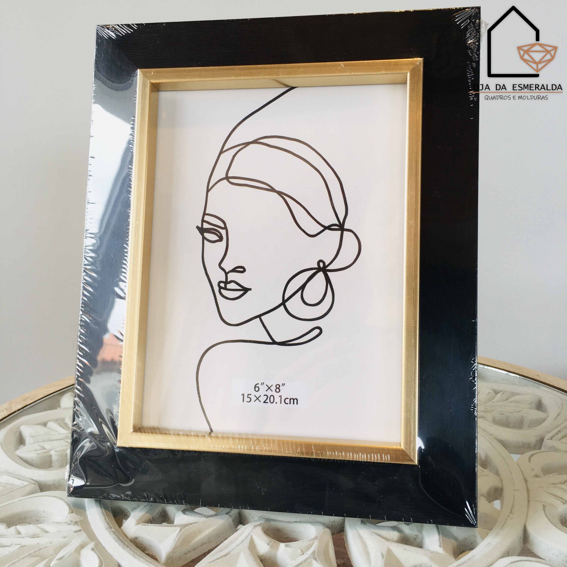 Moldura fotográfica preta com desenho minimalista de rosto feminino e texto 6'X8' 15X20.1cm