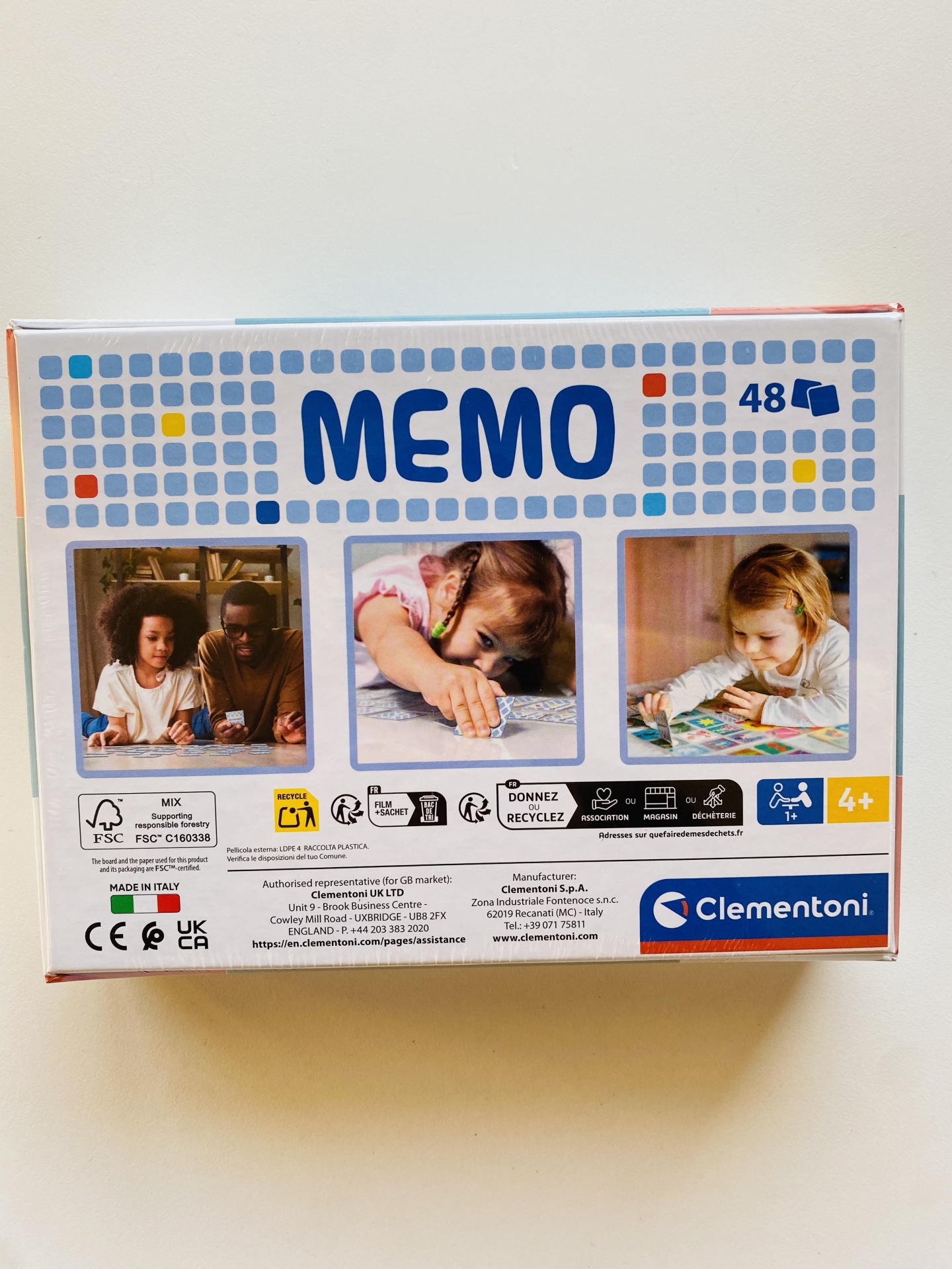 Embalagem do jogo MEMO da Clementoni com 48 peças e imagens de crianças a jogar.