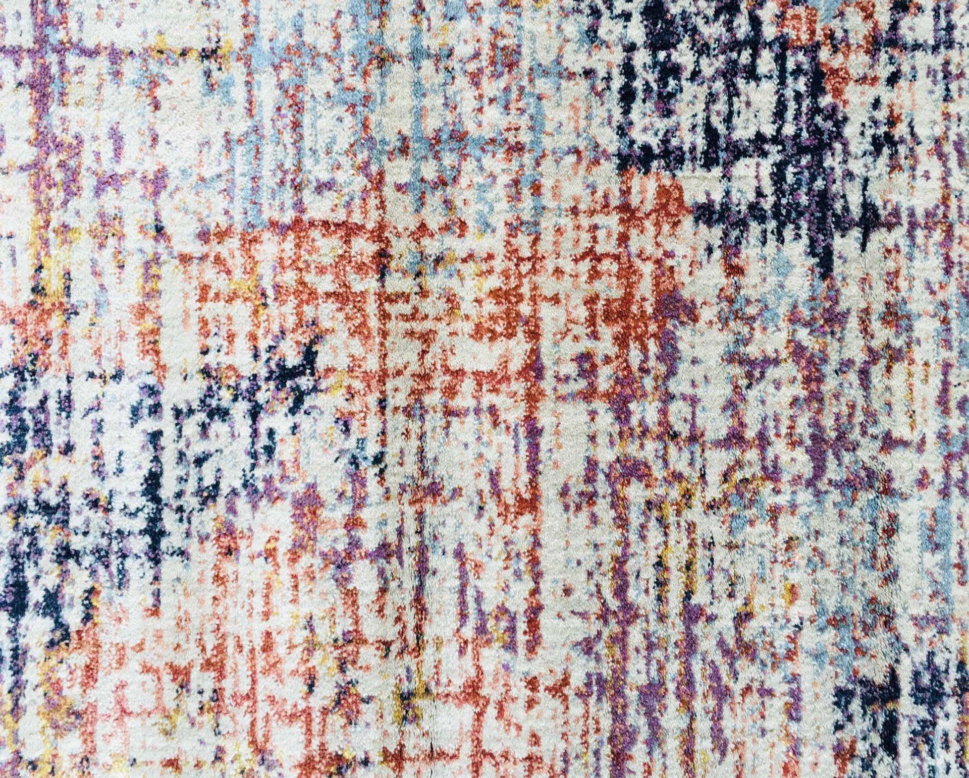 Tapete com padrão abstracto multicolorido e textura felpuda