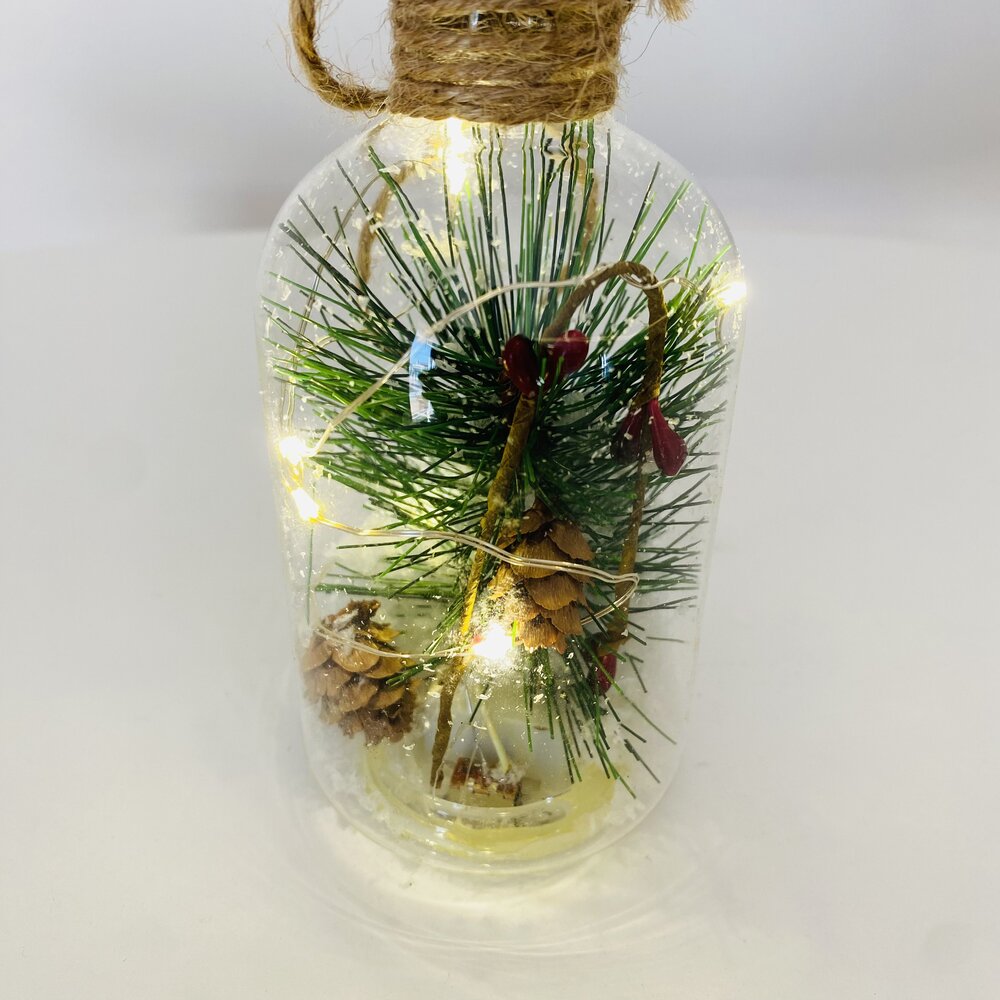 Frasco decorativo com raminhos de pinheiro e luzes LED