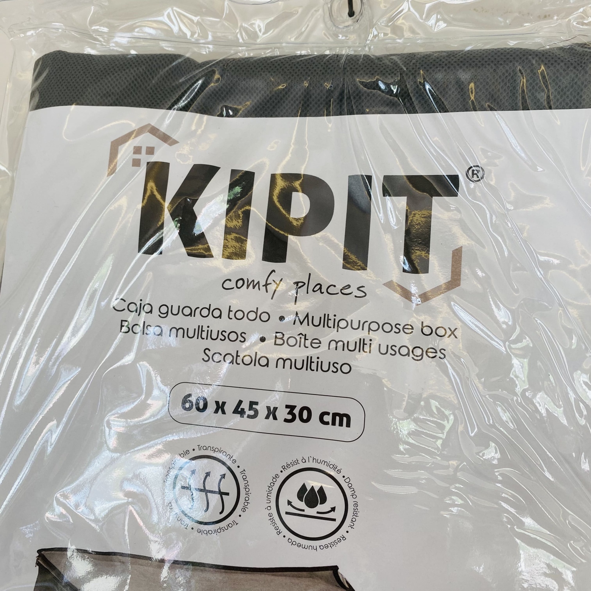 Caixa multipurpose KIPIT preta e branca em embalagem plástica transparenta com dimensões 60x45x30 cm