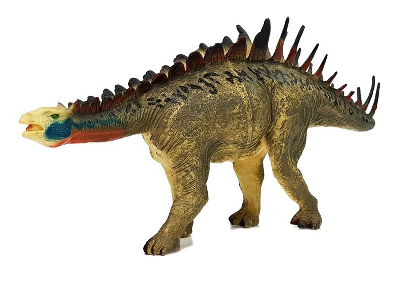Figura de dinossauro com espinhos nas costas e textura rugosa
