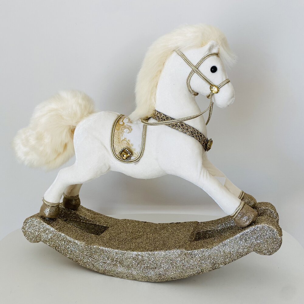 Cavalo baloiço branco com detalhes dourados e base cintilante