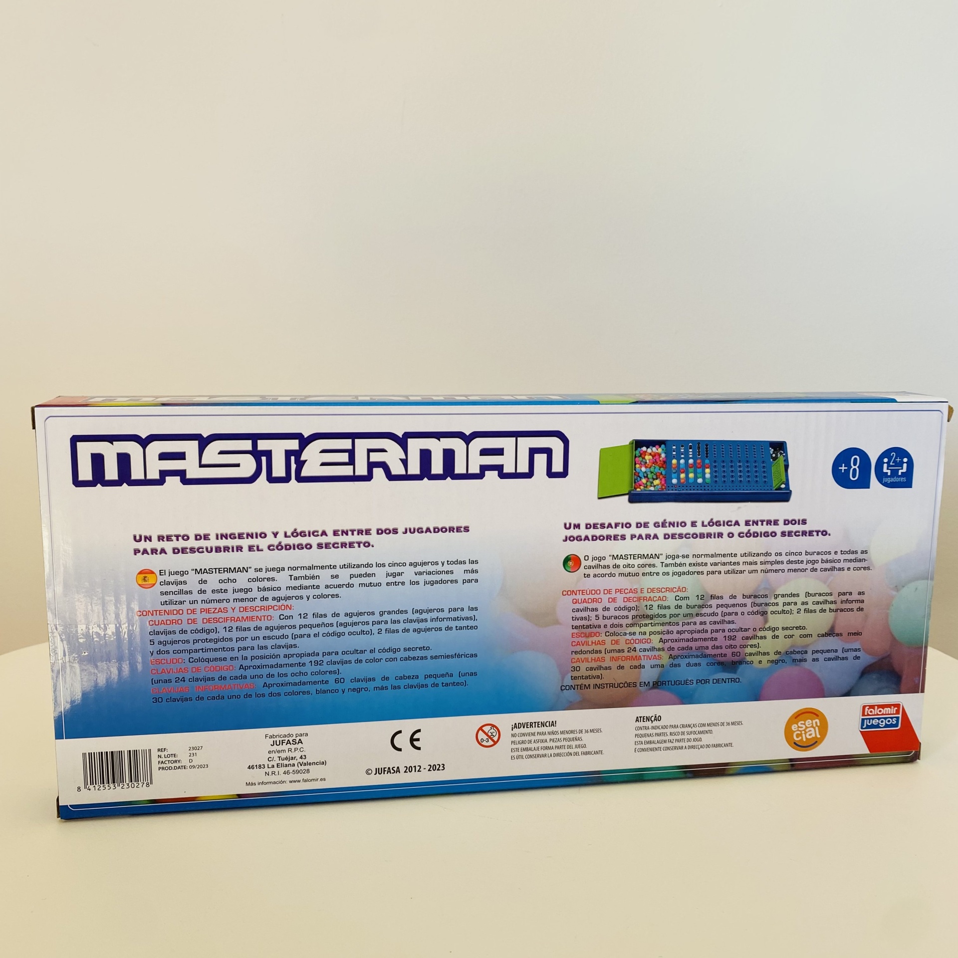 Embalagem do jogo Masterman com texto explicativo e cores pastel