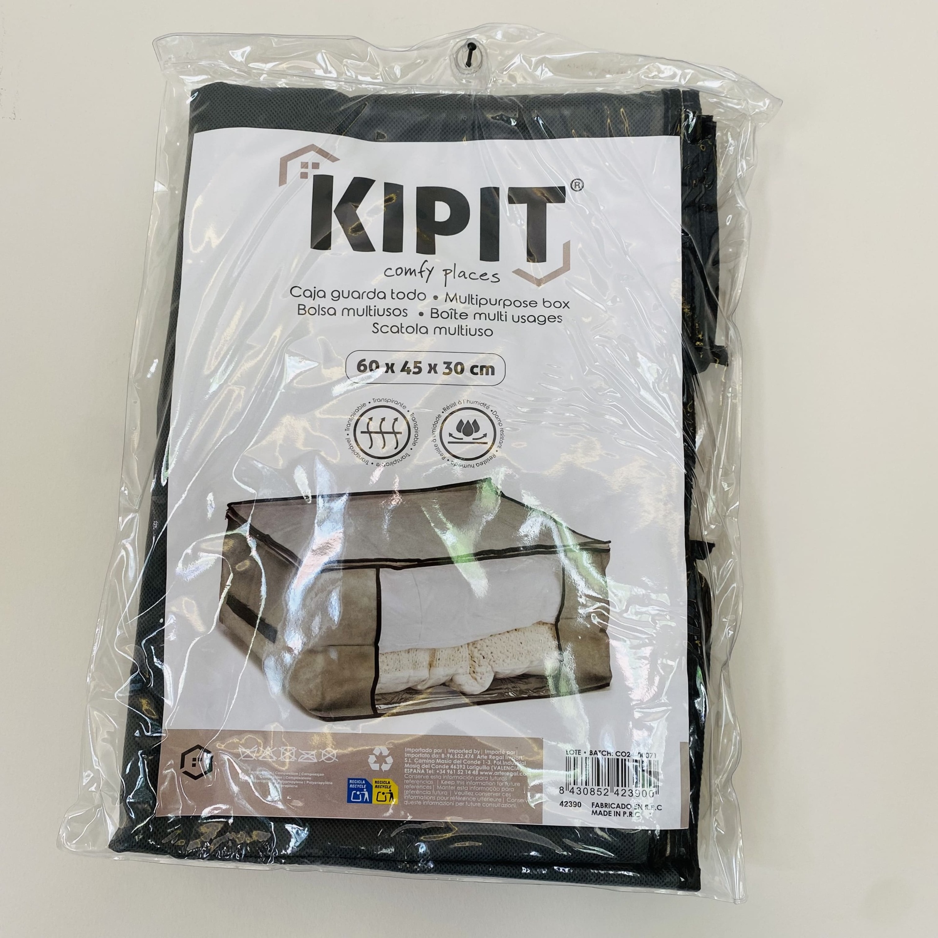 Bolsa multiusos KIPIT com fecho preto embalada em saco plástico