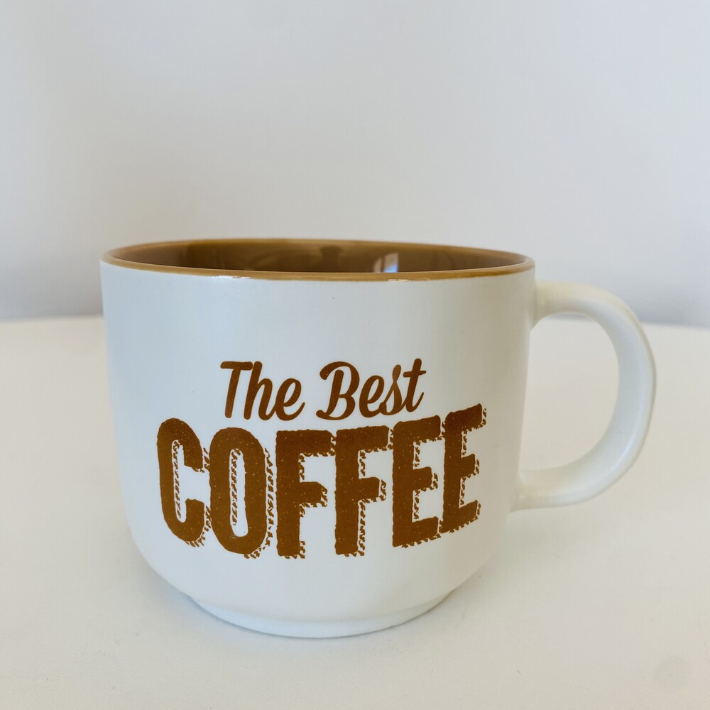 Caneca branca com texto The Best COFFEE