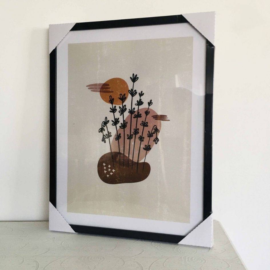 Quadro decorativo com moldura preta e imagem abstrata de ramos e formas geométricas