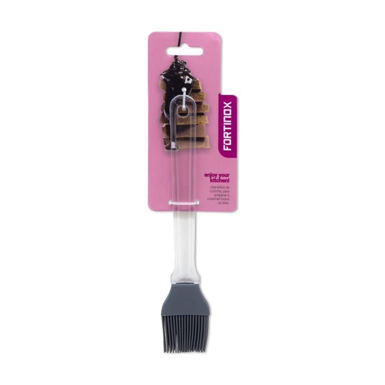 Pincel de silicone cinza com cabo transparente embalada numa cartolina rosa com marca e texto
