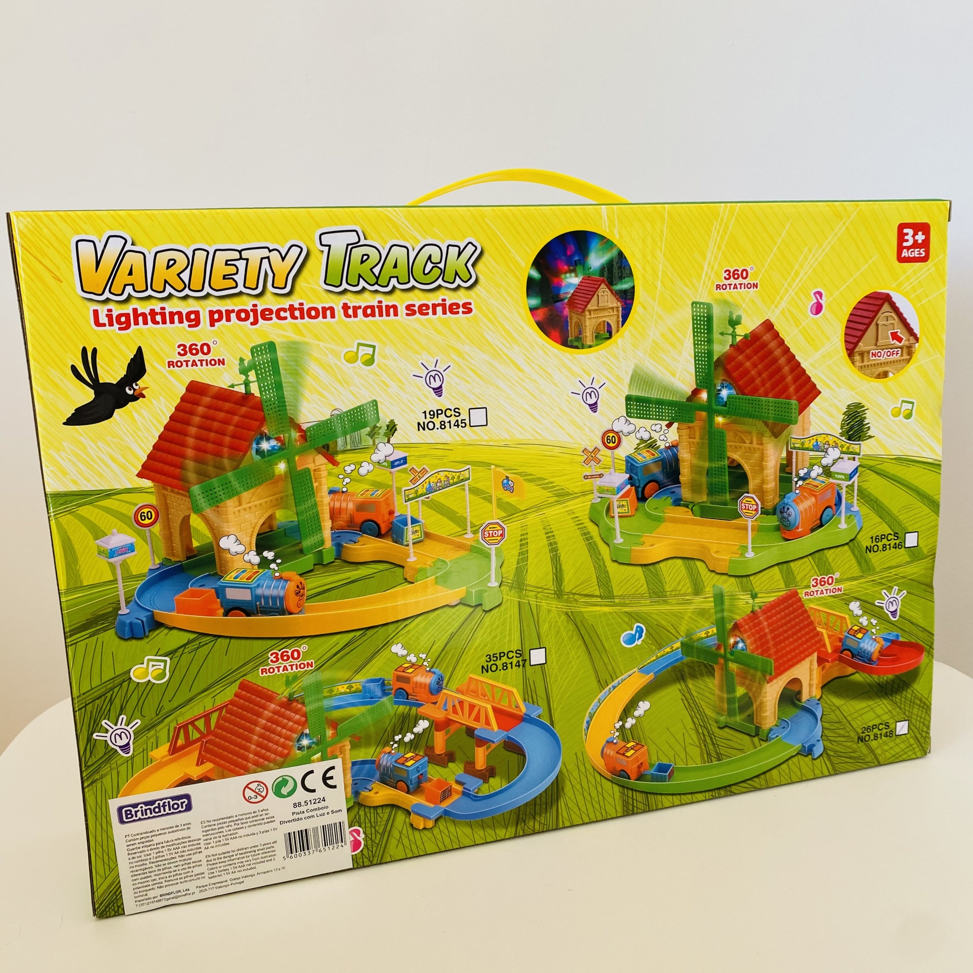 Embalagem amarela de brinquedo Variety Track com pista de comboio e moinhos de vento