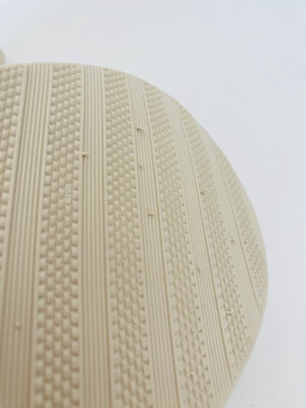 Padrão da sola de sapato bege com textura em relevo