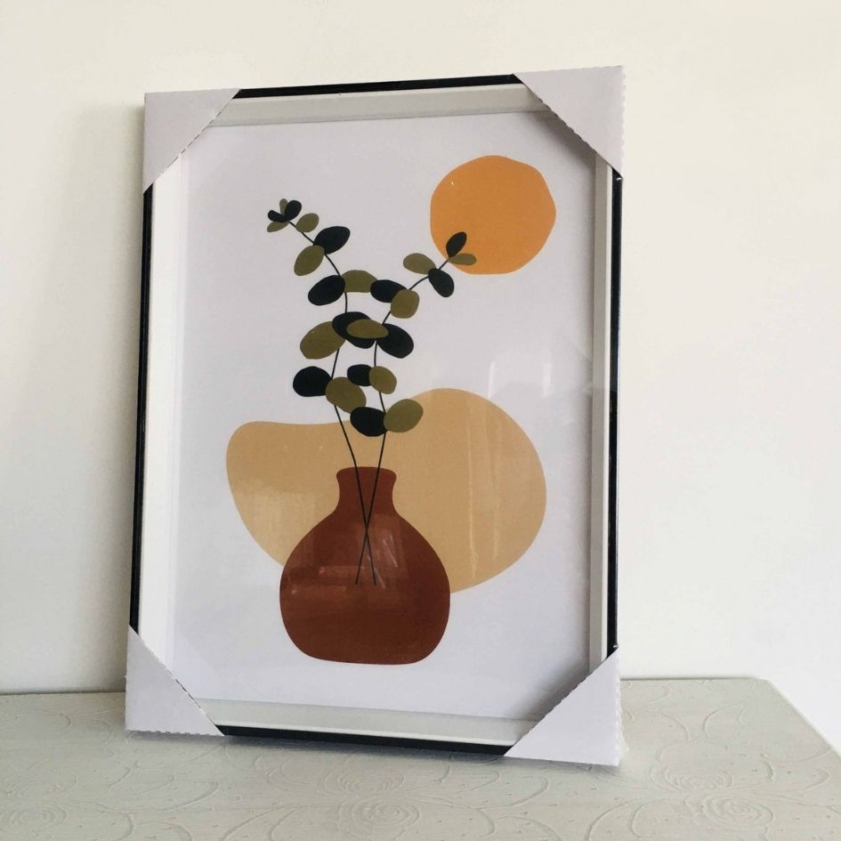 Quadro com desenho abstrato de vaso e folhas em várias tonalidades