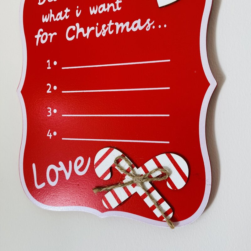 Placa decorativa vermelha com lista de desejos de Natal e bengalas de doces de madeira