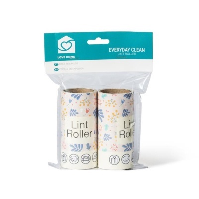 Embalagem com dois rolos de fita adesiva para remoção de fiapos com padrão floral e texto visível.