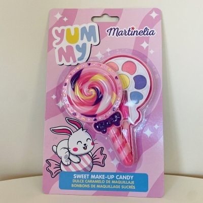 Maquilhagem infantil em embalagem com pirulito e coelho desenhado