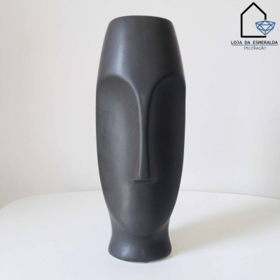 Vaso decorativo preto em forma de face humana com fundo branco e logótipo da loja