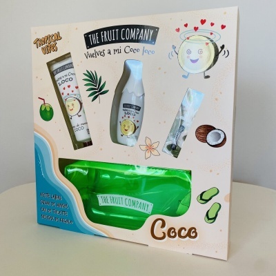 Embalagem de produto THE FRUIT COMPANY com imagens e texto relacionados a coco e tropical vibes