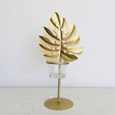 Suporte decorativo dourado para vela em forma de folha com copo de vidro