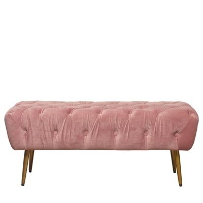 Banco estofado rosa em veludo com botões decorativos e pernas douradas