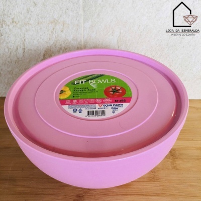 Tigela rosa com tampa e rótulo da marca FIT BOWLS em fundo claro