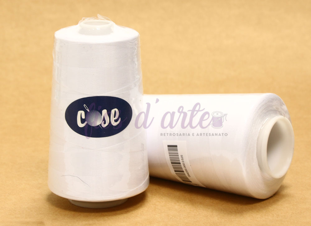 Linha costura | 5000mts | Cose Cones de linha de costura branca com rótulo 'cose' sobre superfície castanha