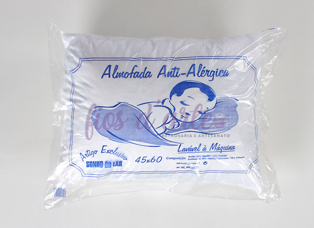 Almofada bebé Antialérgica (60x45cms) Almofada anti-alérgica embalada com desenho de bebé a dormir e texto em azul