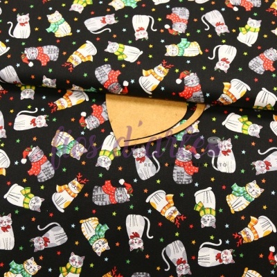 tecido preto com padrão de gatos brancos vestidos coloridos