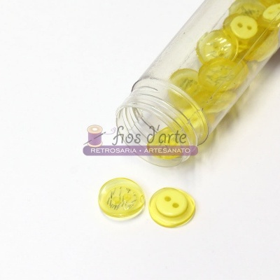 Frasco transparente com botões amarelos e logótipo Fios d'arte