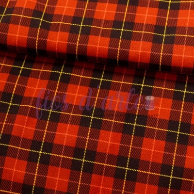 Tecido xadrez vermelho, preto, laranja e amarelo dobrado