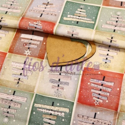 Tecido estampado com árvores de Natal em quadrados coloridos pastel