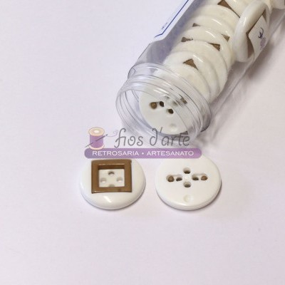 Frasco com botões brancos redondos e um botão com moldura dourada quadrada