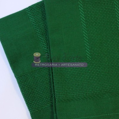 Pano verde com padrões e etiqueta com texto