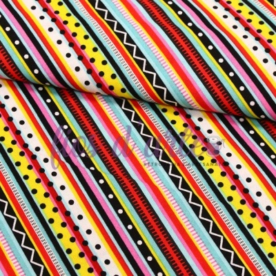 Tecido com padrão de listras coloridas e pontos pretos