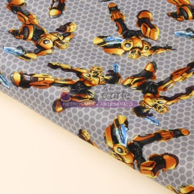 Tecido com padrão de robôs futuristas amarelos e pretos sobre fundo cinzento hexagonal