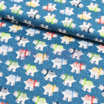 Tecido azul com padrão de dinossauros brancos coloridos