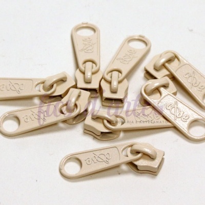 Puxadores de fecho éclair bege com texto 'coza'