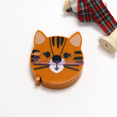 Fita métrica em caixa plástica com design de rosto de gato cor de laranja