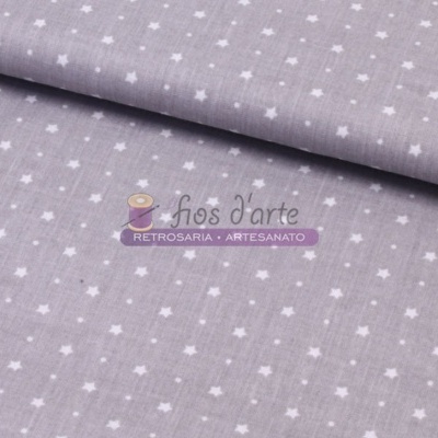 Tecido cinza com estrelas brancas dobrado