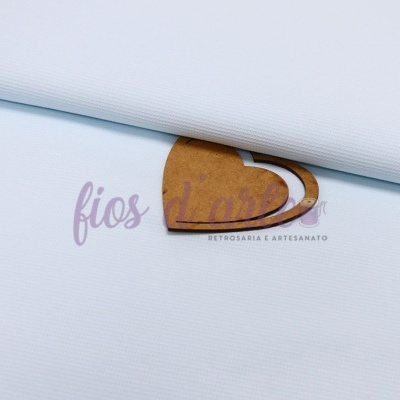 Rolo de tecido azul claro com etiqueta de papel castanha e texto fios d'arte