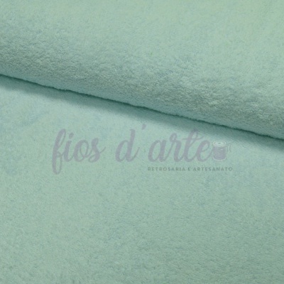Tecido felpa verde-água enrolado