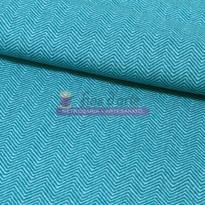 Tecido azul claro com padrão espinha de peixe dobrado