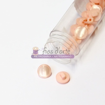Frasco com botões de pressão rosa claro perolados